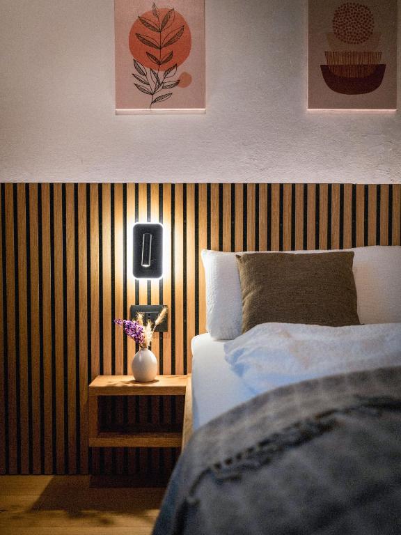 Posteľ alebo postele v izbe v ubytovaní Bergblick Apartment in Zentrumsnähe mit Garage