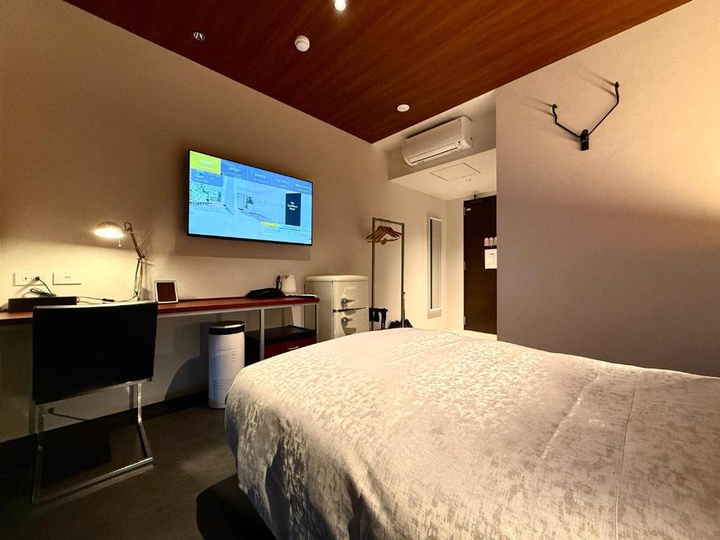 Bakery Hotel SHIRAHAMA ベーカリーホテル シラハマにあるテレビまたはエンターテインメントセンター