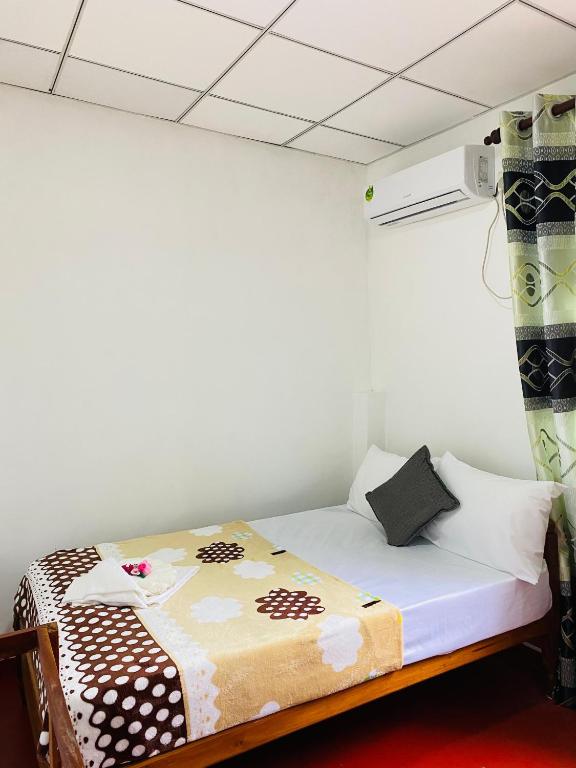 Postel nebo postele na pokoji v ubytování Sun Reich - Airport Transit Hotel