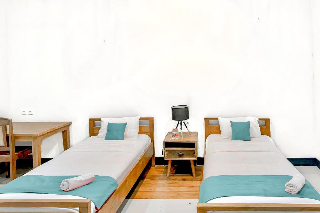 MYHOME Blora Mitra RedDoorz - Deluxe Twin Room