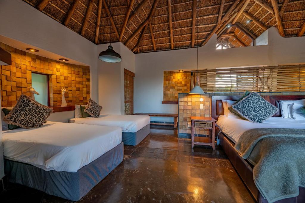 Letto o letti in una camera di Muluwa Lodge