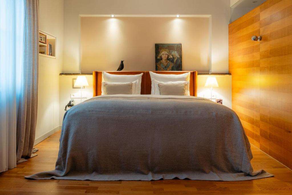 Postel nebo postele na pokoji v ubytování Boutique & Design Hotel AUERSPERG