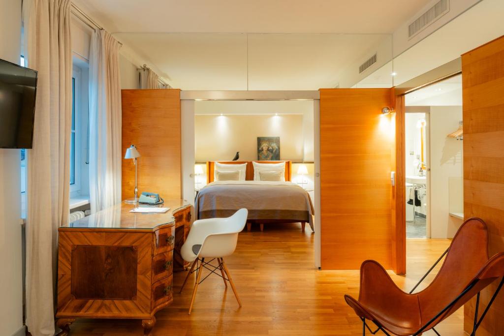 Postel nebo postele na pokoji v ubytování Boutique & Design Hotel AUERSPERG