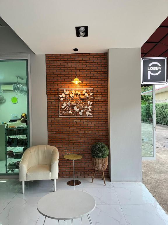 Posezení v ubytování Papangkorn House