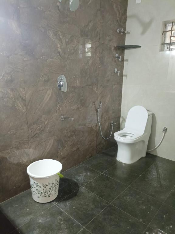 Koupelna v ubytování Ameya Coorg Home Stay