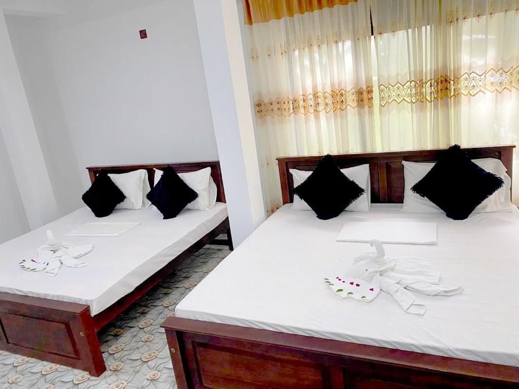 Postel nebo postele na pokoji v ubytování Haritha Resort Yala