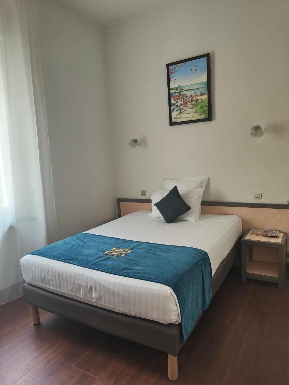 Postel nebo postele na pokoji v ubytování Will's Hotel