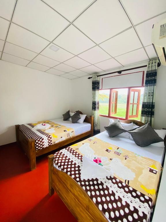 Postel nebo postele na pokoji v ubytování Sun Reich - Airport Transit Hotel