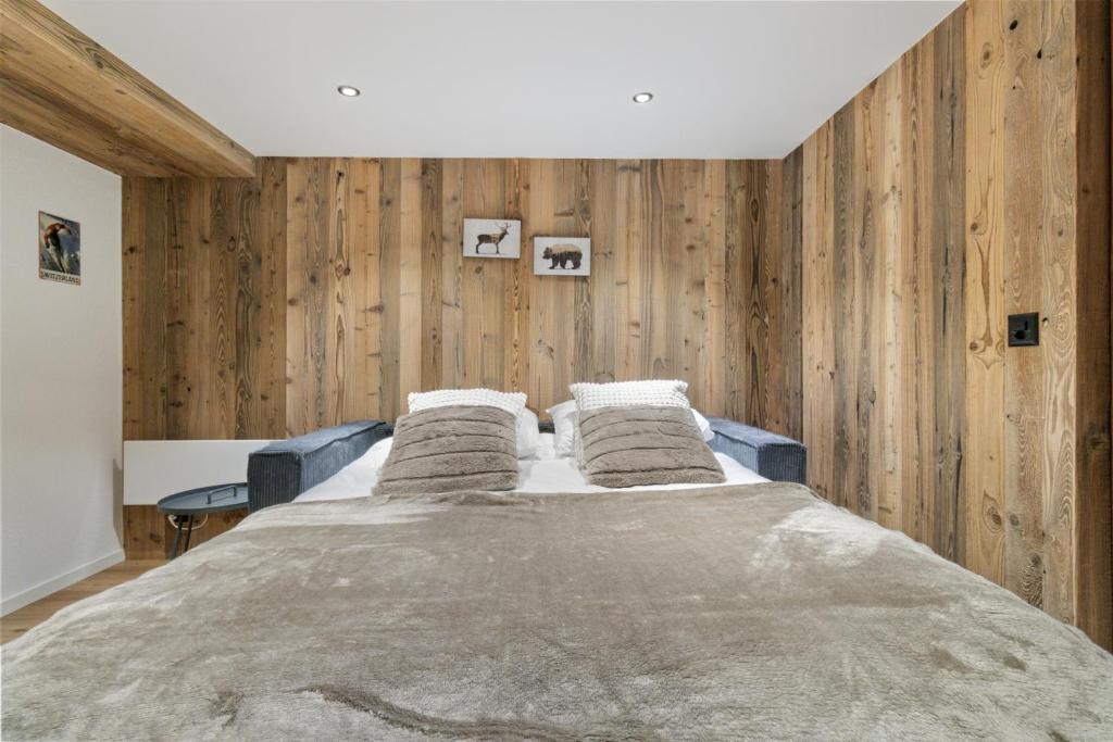 Postel nebo postele na pokoji v ubytování Studio rénové au centre de Saas-Fee