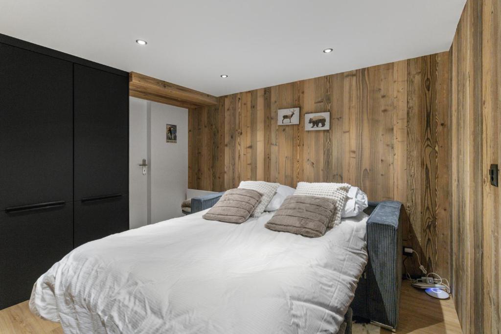 Postel nebo postele na pokoji v ubytování Studio rénové au centre de Saas-Fee