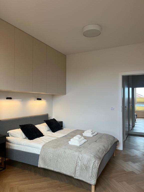 Postel nebo postele na pokoji v ubytování Apartament N13