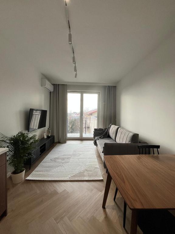 TV a/nebo společenská místnost v ubytování Apartament N13