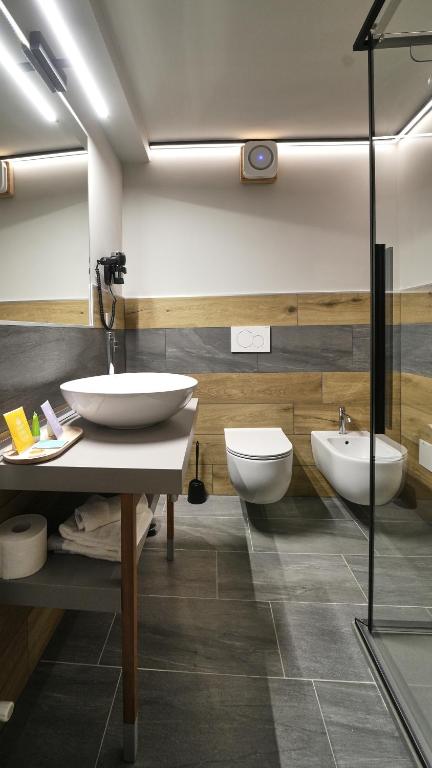 Koupelna v ubytování Hotel Perruquet