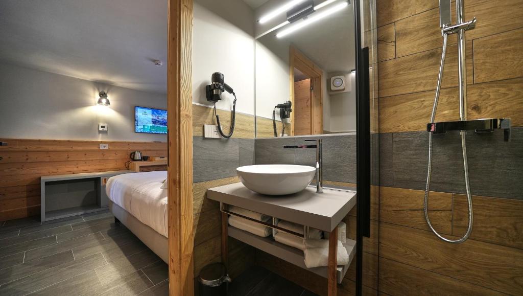 Koupelna v ubytování Hotel Perruquet