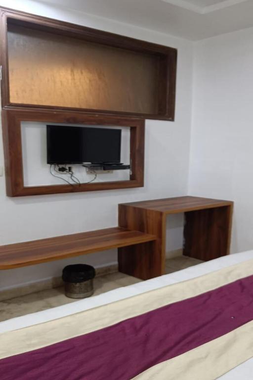 TV a/nebo společenská místnost v ubytování Hotel A10 International