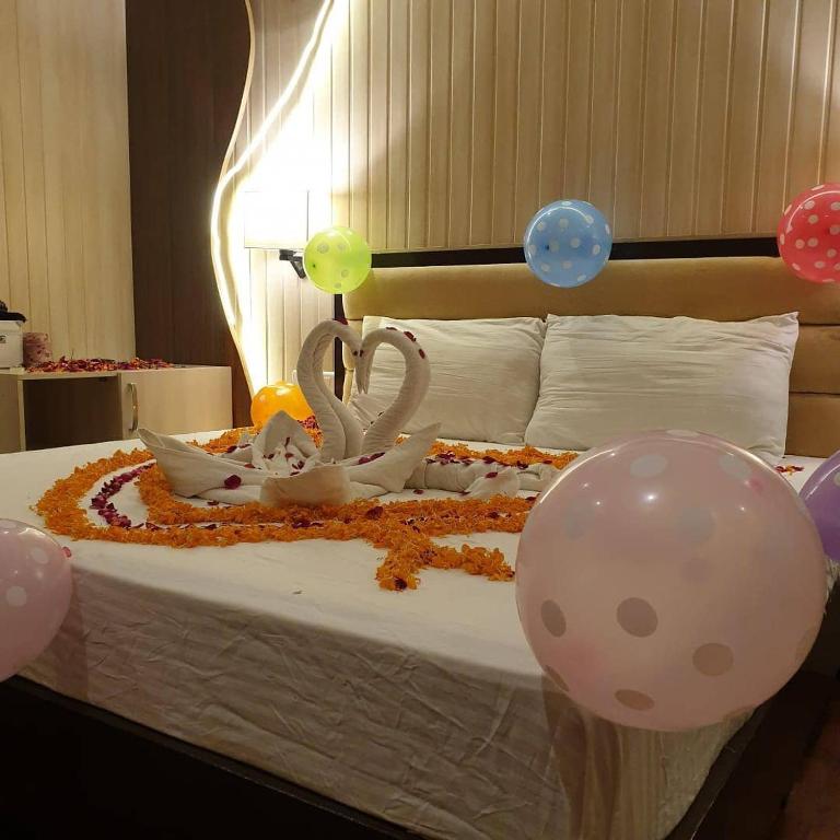 Letto o letti in una camera di The Royal Residence Inn
