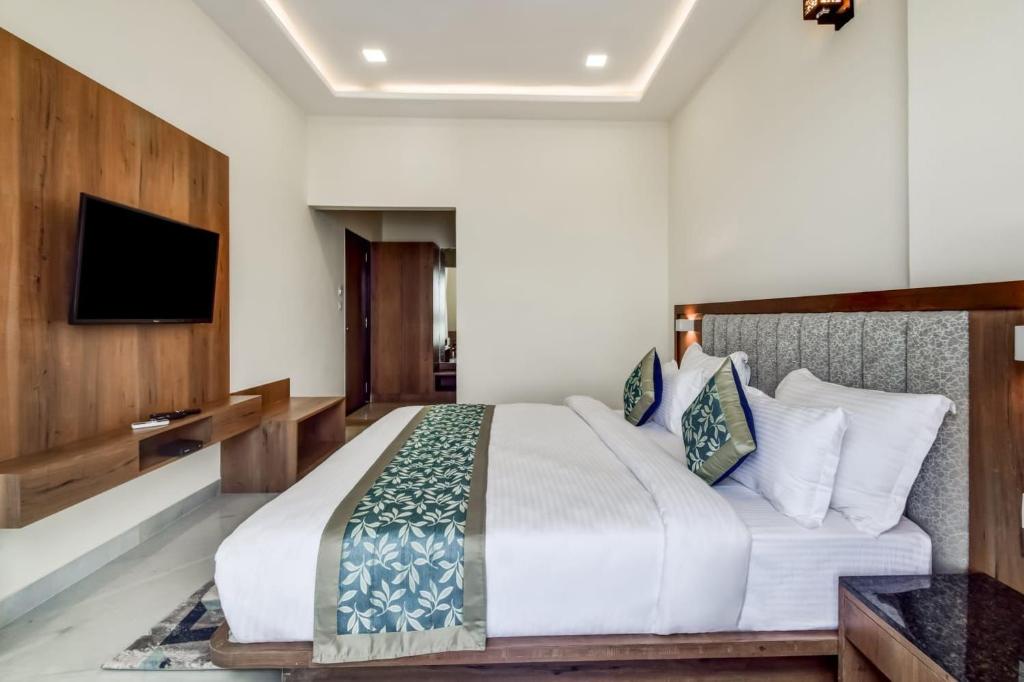 Letto o letti in una camera di The Royal Residence Inn