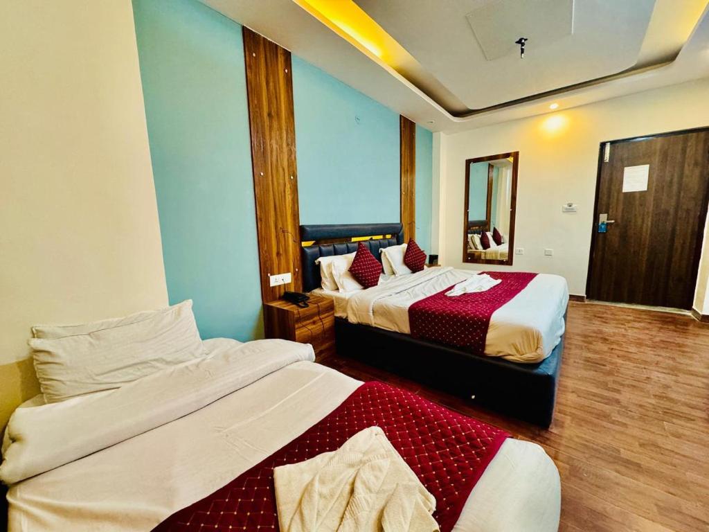 Letto o letti in una camera di The Royal Residence Inn