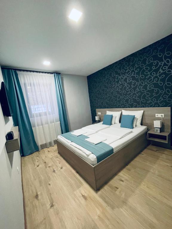 Postel nebo postele na pokoji v ubytování Thermal Apartman