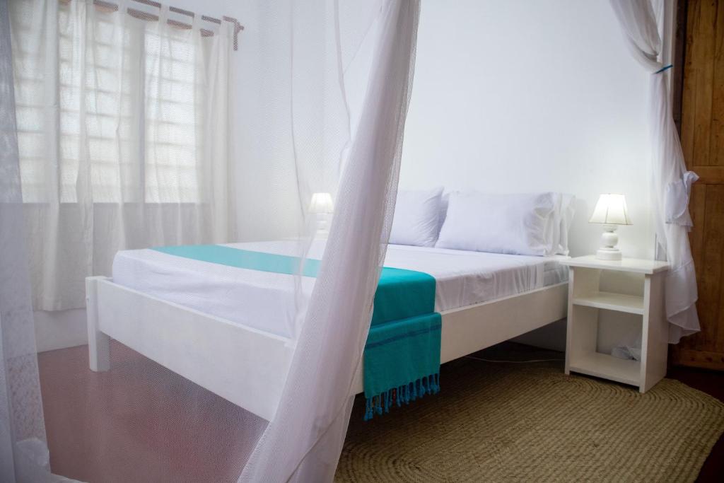 Postel nebo postele na pokoji v ubytování Gabsgate Resort