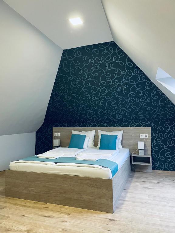 Postel nebo postele na pokoji v ubytování Thermal Apartman