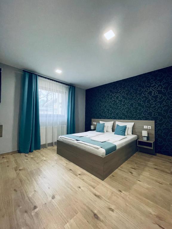 Postel nebo postele na pokoji v ubytování Thermal Apartman