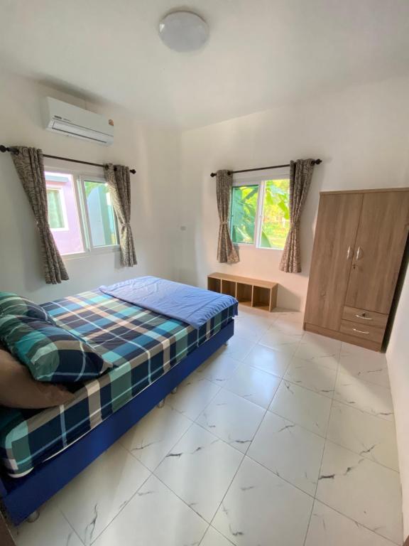Postel nebo postele na pokoji v ubytování WhyNot Villa