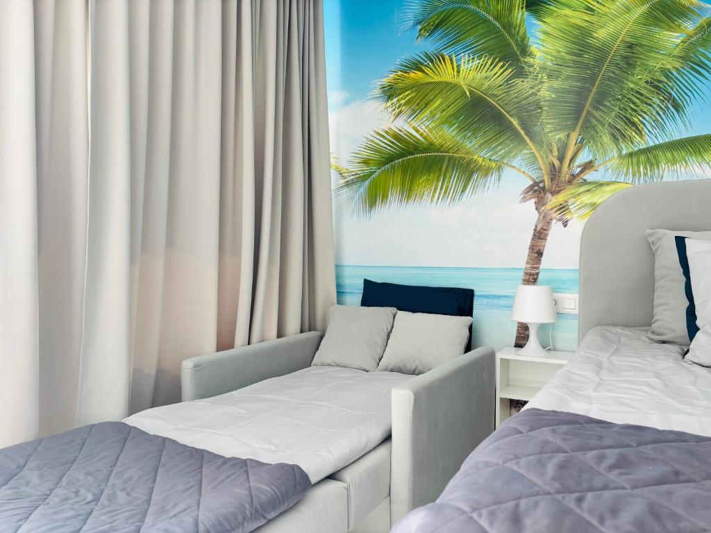 Ένα ή περισσότερα κρεβάτια σε δωμάτιο στο Blue Ocean Costa Adeje 506