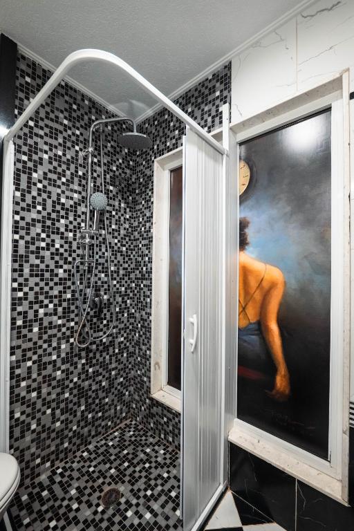 Koupelna v ubytování Hotel Aria