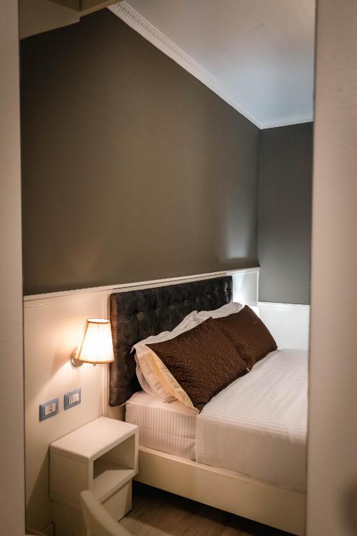 Postel nebo postele na pokoji v ubytování Hotel Aria