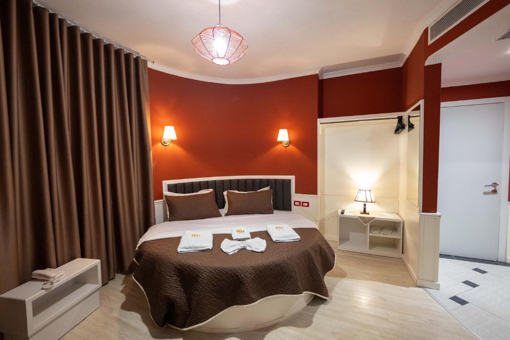 Postel nebo postele na pokoji v ubytování Hotel Aria