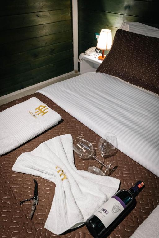 Postel nebo postele na pokoji v ubytování Hotel Aria