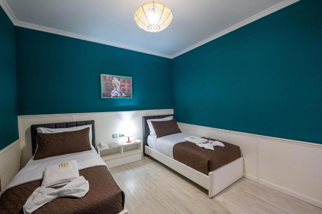 Postel nebo postele na pokoji v ubytování Hotel Aria