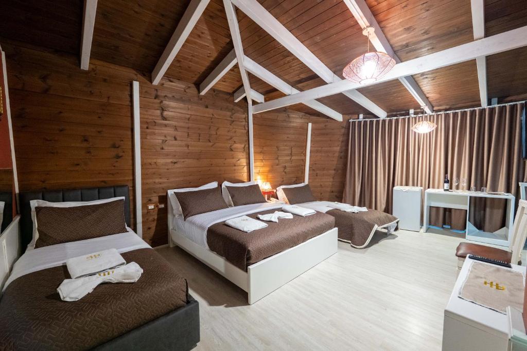 Postel nebo postele na pokoji v ubytování Hotel Aria