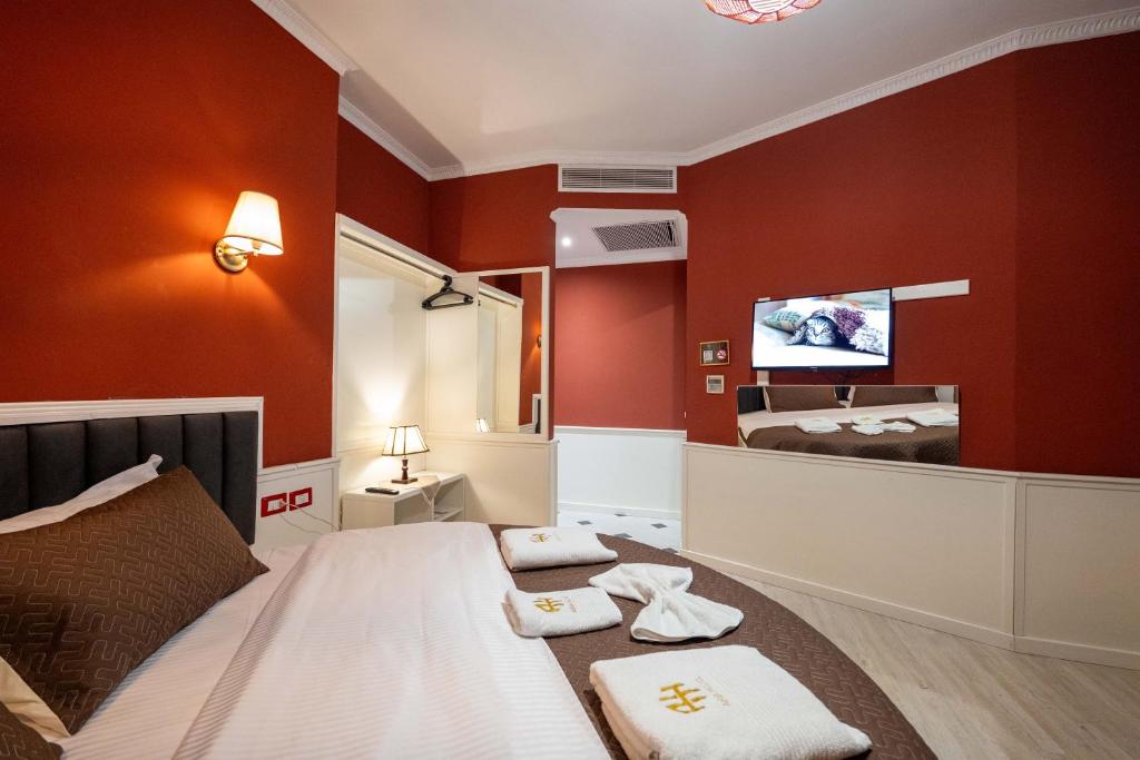 TV a/nebo společenská místnost v ubytování Hotel Aria