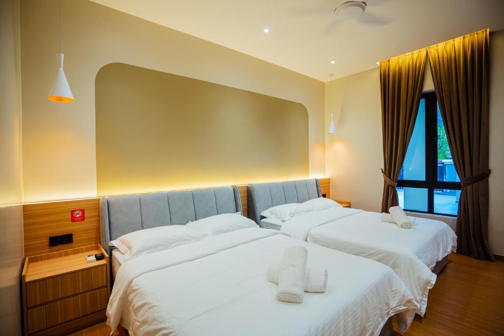 Ένα ή περισσότερα κρεβάτια σε δωμάτιο στο Ipoh Modern Luxury House 4B3B 14 pax