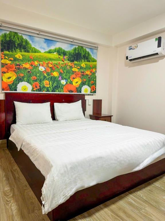 Postel nebo postele na pokoji v ubytování Minh Trang Motel
