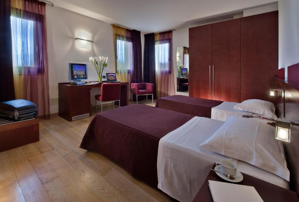 Postel nebo postele na pokoji v ubytování Annia Park Hotel Venice Airport
