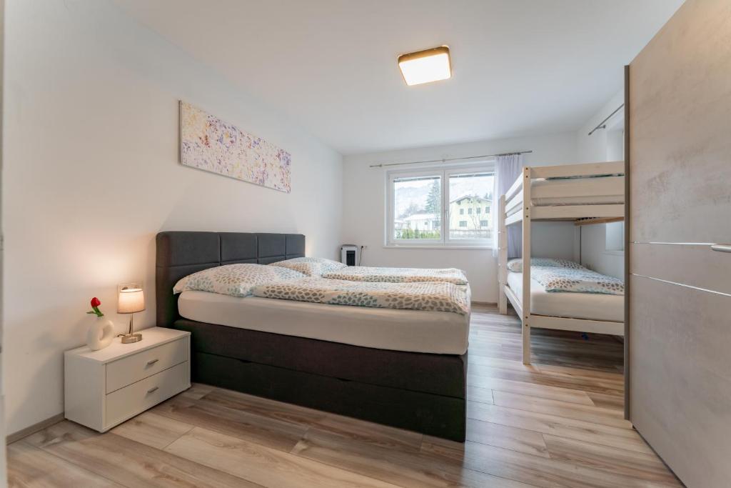 Postel nebo postele na pokoji v ubytování Apartments Kabashi 2 RIVER View