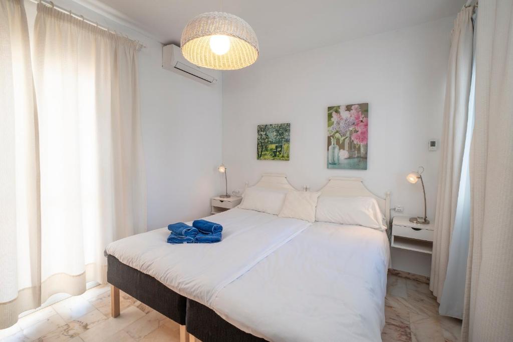 A bed or beds in a room at RESIDENSOL 13 MENYBER