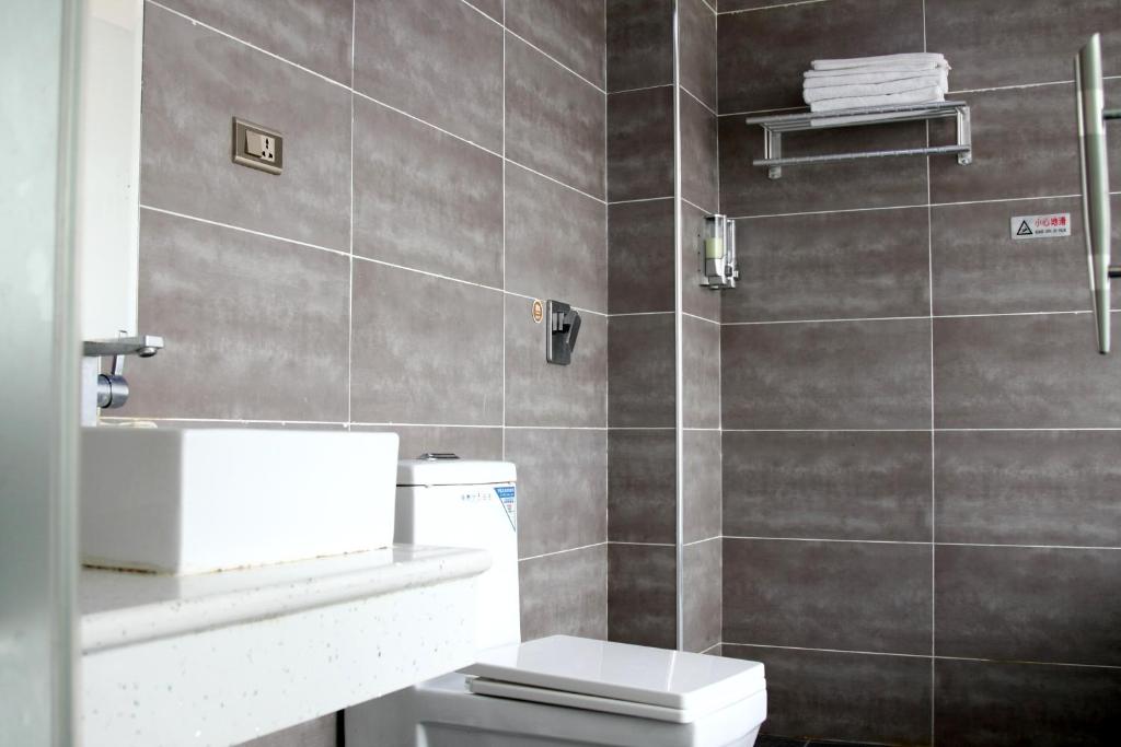 Koupelna v ubytování Wudangshan Daohe Inn