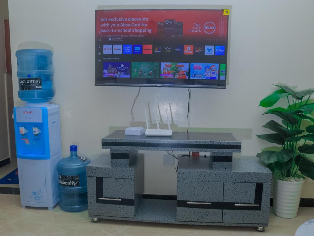 a lego table with a computer on top of it at Theraistays in Nairobi
