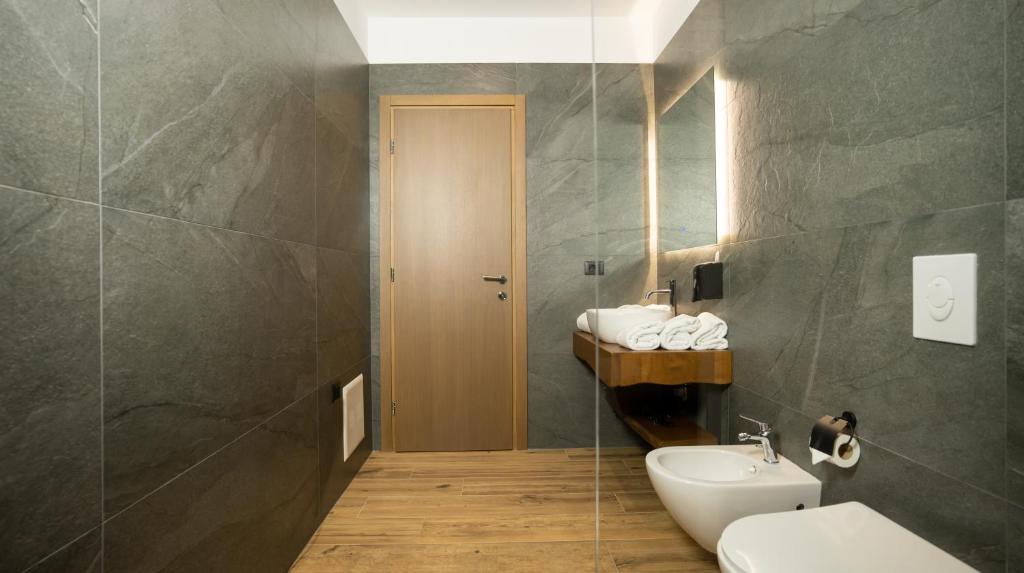 Koupelna v ubytování Porta e Alpeve
