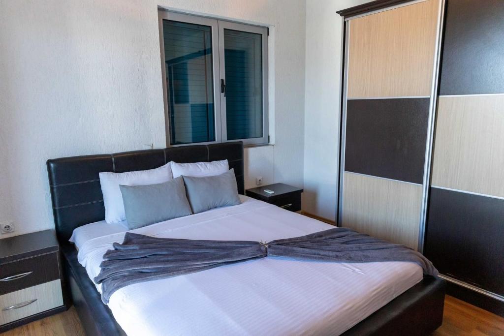 Postel nebo postele na pokoji v ubytování Sunshine Apartments