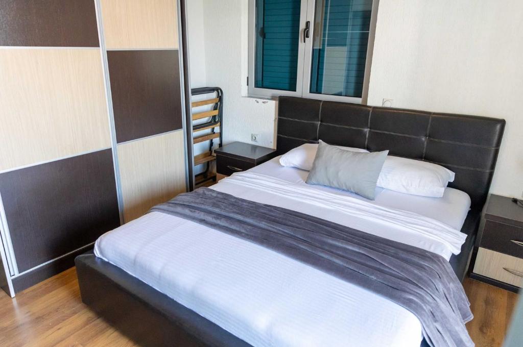 Postel nebo postele na pokoji v ubytování Sunshine Apartments