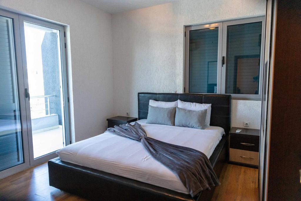 Postel nebo postele na pokoji v ubytování Sunshine Apartments
