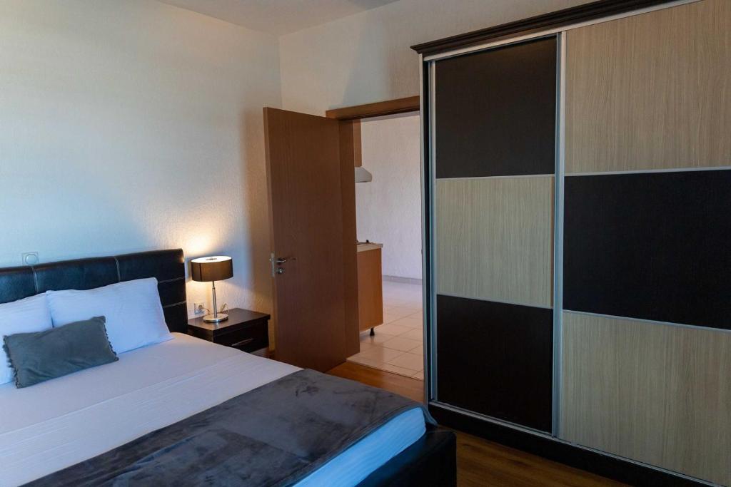Postel nebo postele na pokoji v ubytování Sunshine Apartments