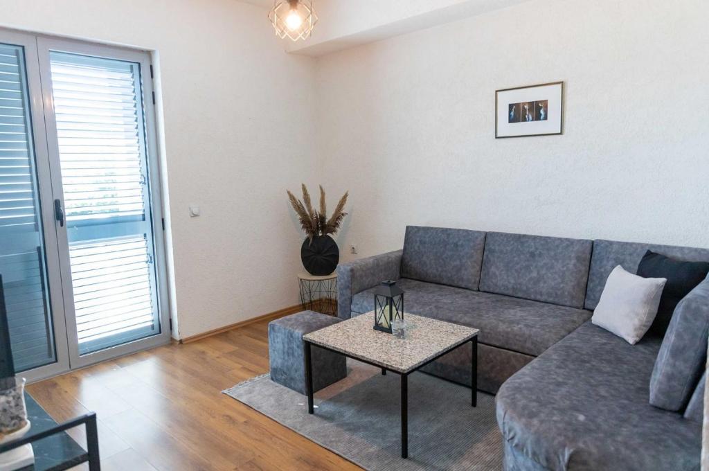 Posezení v ubytování Sunshine Apartments