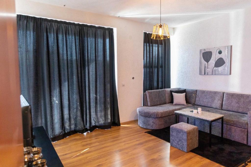 Posezení v ubytování Sunshine Apartments