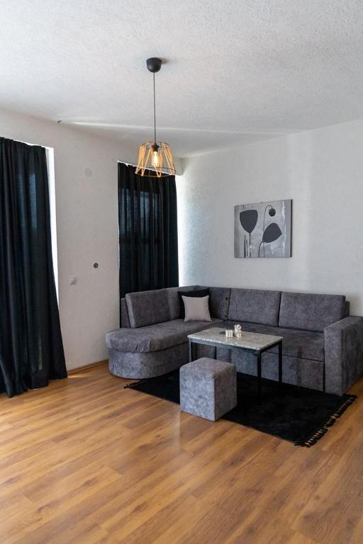 Posezení v ubytování Sunshine Apartments
